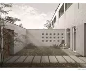 The interior of the private gardens in front of the entrance to the building