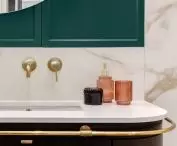 Bathroom with gold railing 