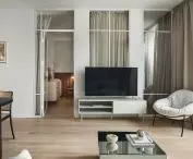 Behind the glazing is a bedroom
