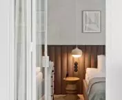 A fragment of the bedroom visible from the living room
