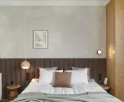 Bedroom with quilted bed headboard
