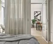 Curtains separate the space