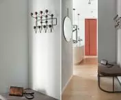 Minimalist hallway leads to kitchen