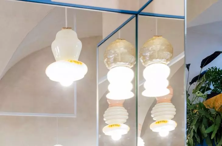 Lanterns are duplicated by reflections in mirrors