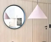 round mirrors optically enlarge the space