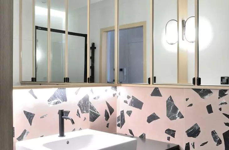 bathroom space is optically enlarged by mirrors