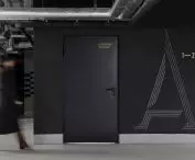 painted on black walls, the signs in the garage resemble the carved shapes of the other signs