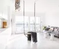 Swing suspended in the center of the living room