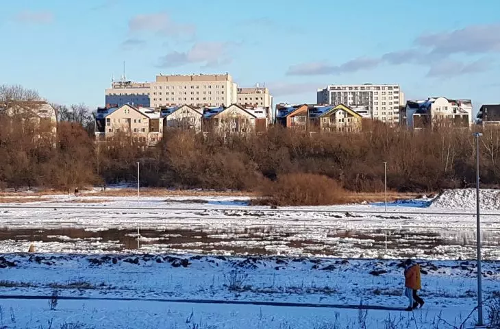 Panorama of the east bank of the Warta River in the center. 