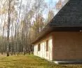 The facade of the house is covered with wood