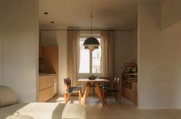 view from the living room to the kitchen and dining room