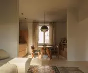 view from the living room to the kitchen and dining room