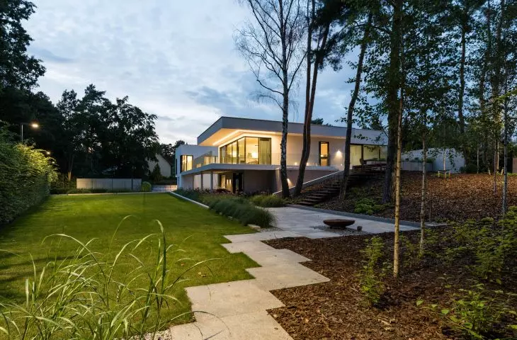 The house was built on a slope above the lake