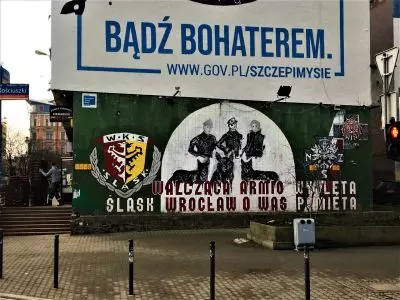 lower mural of Slask Wroclaw club supporters on the south gable wall of the building dolny mural of Slask Wroclaw club supporters on the south gable wall of the building