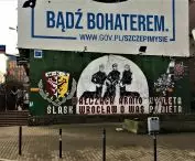 Lower mural of supporters of Slask Wroclaw club on the south gable wall of the building