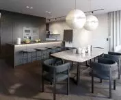 Dark kitchen and dining room with stone table