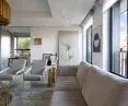 Bright living room in northern Italian style