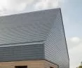płytki Cedral na dachu oraz fragmencie elewacji domu jednorodzinnego w miejscowości Ligny (Belgia)