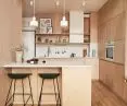 The kitchen is connected to the rest of the apartment and liquefies the use of the interior