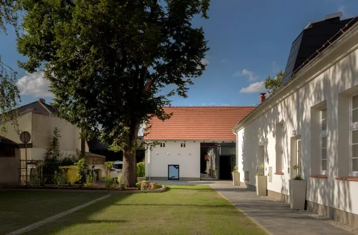 between the buildings there is a kindergarten courtyard