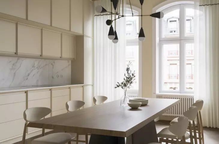modern furniture and accessories are juxtaposed with ornate stuccowork