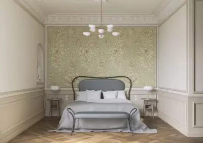 tapeta from the William Morris collection on one of the walls in the bedroom