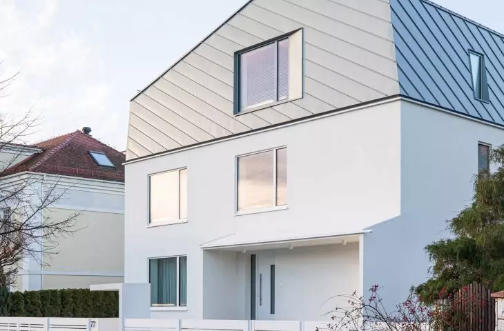 The mansard roof crowning the house is perversely skewed