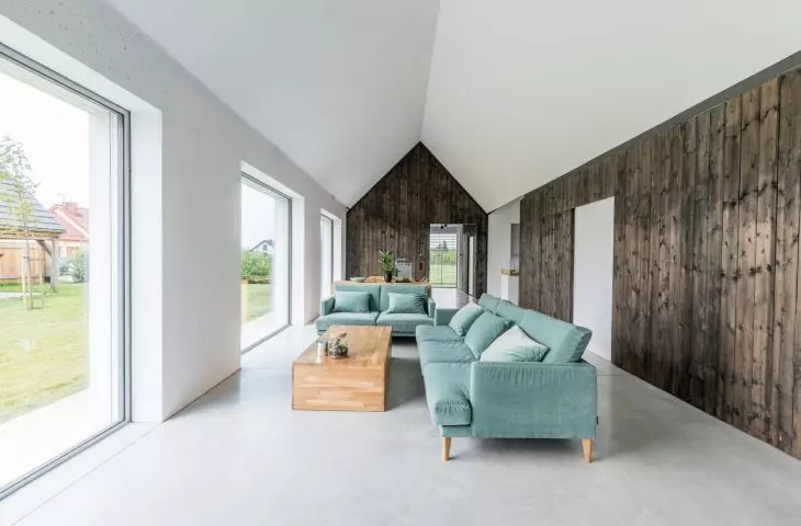 The house is divided into open common and private spaces enclosed in smaller blocks in the archetypal shape of a house