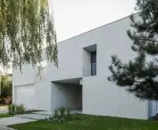 compact, light gray body of the house is a cuboid