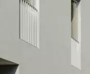 Facade detail, simple steel railings made of flat bars