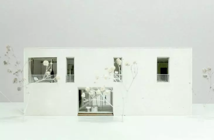 mock-up photo; west elevation