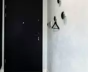 Corridor, hangers by Oskar Zięta