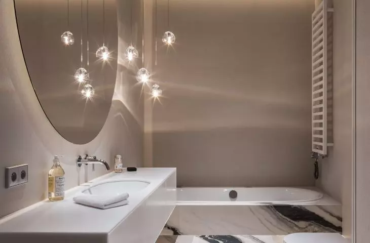Bright bathroom interior with stone flooring
