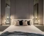 The center of the bedroom is a comfortable bed