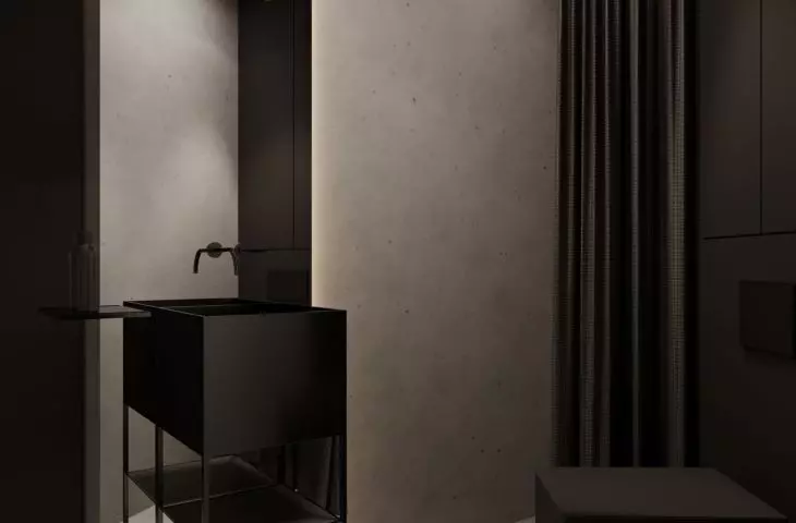 Bathroom kept in dark colors