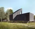 The facade is made of dark board