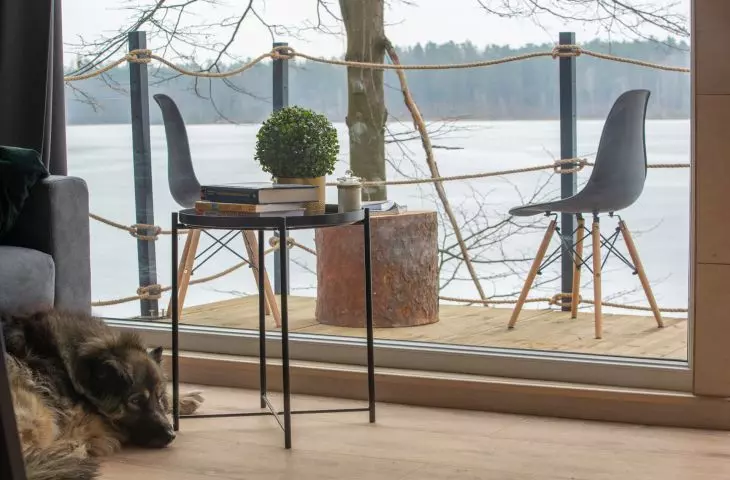 large balcony windows provide picturesque views