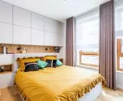 Bedroom with built-in cabinets