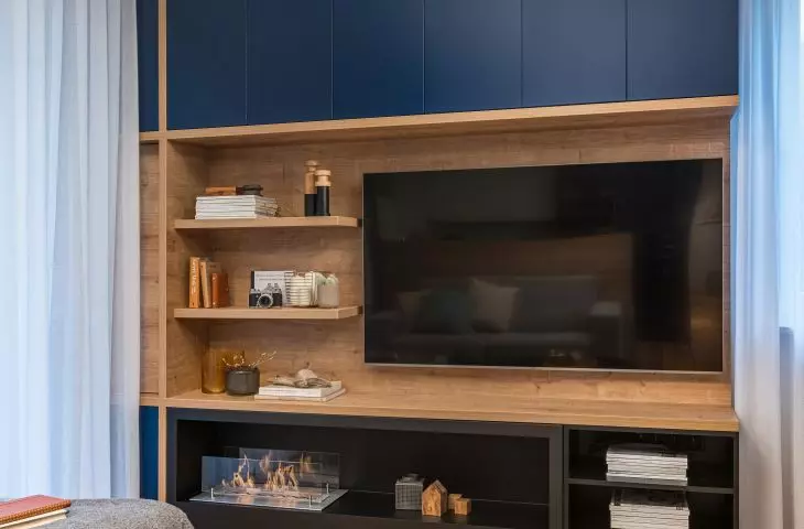 Built-in wall with TV and bio-fireplace