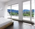 Large format windows overlooking nature.