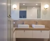 Bathroom accommodates two people at a time