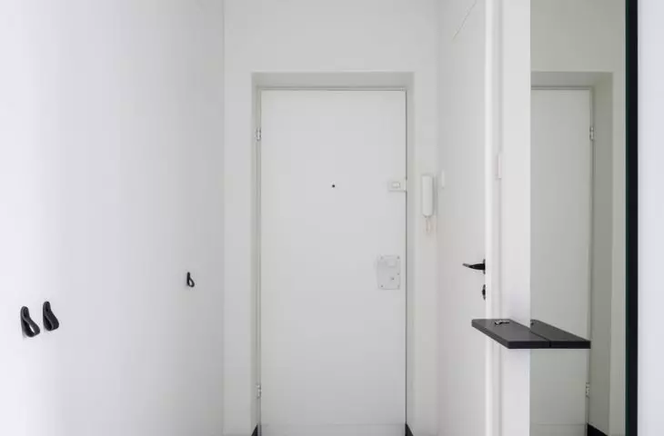 White visually enlarges the hallway