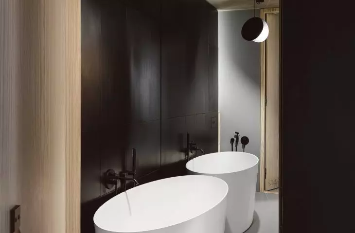 Black cubicle with bathroom