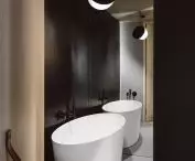 Black cubicle with bathroom