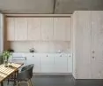 Wooden cubicle creates a kitchen