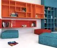 Colorful nursery, bookcases at full wall height