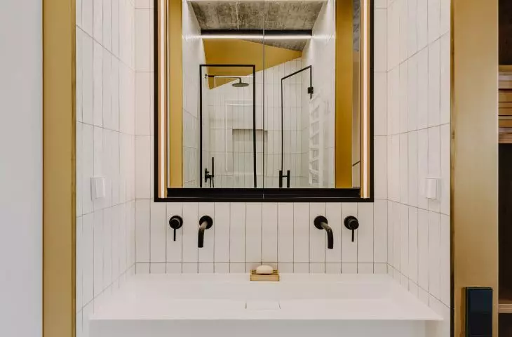 a small bathroom next to the parents' bedroom