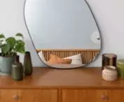 The unformed shape of the mirror makes the interior seem a bit surreal 