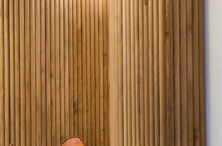 Oak laths in the lobby act as tasteful paneling