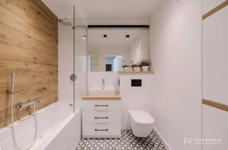 Bright bathroom with wooden accents